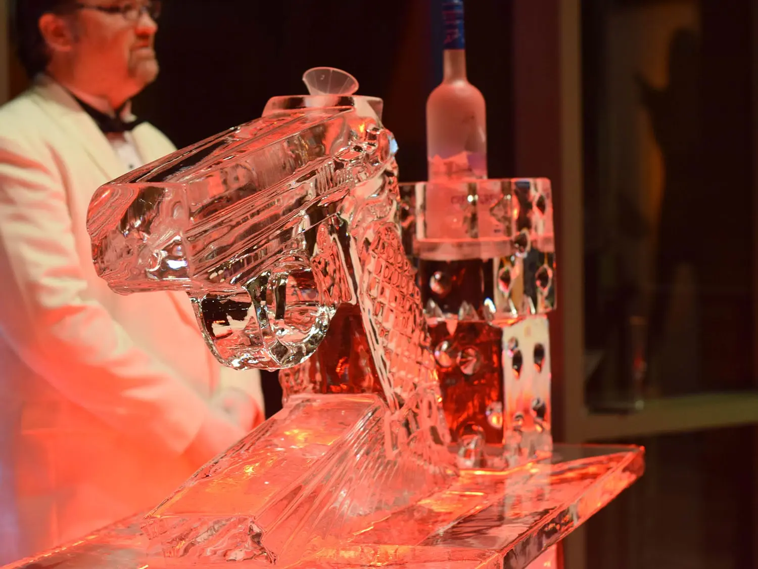 A functional ice sculpture designed to chill liquor as it’s poured through carved channels, adding a dramatic and interactive element to the bar experience.