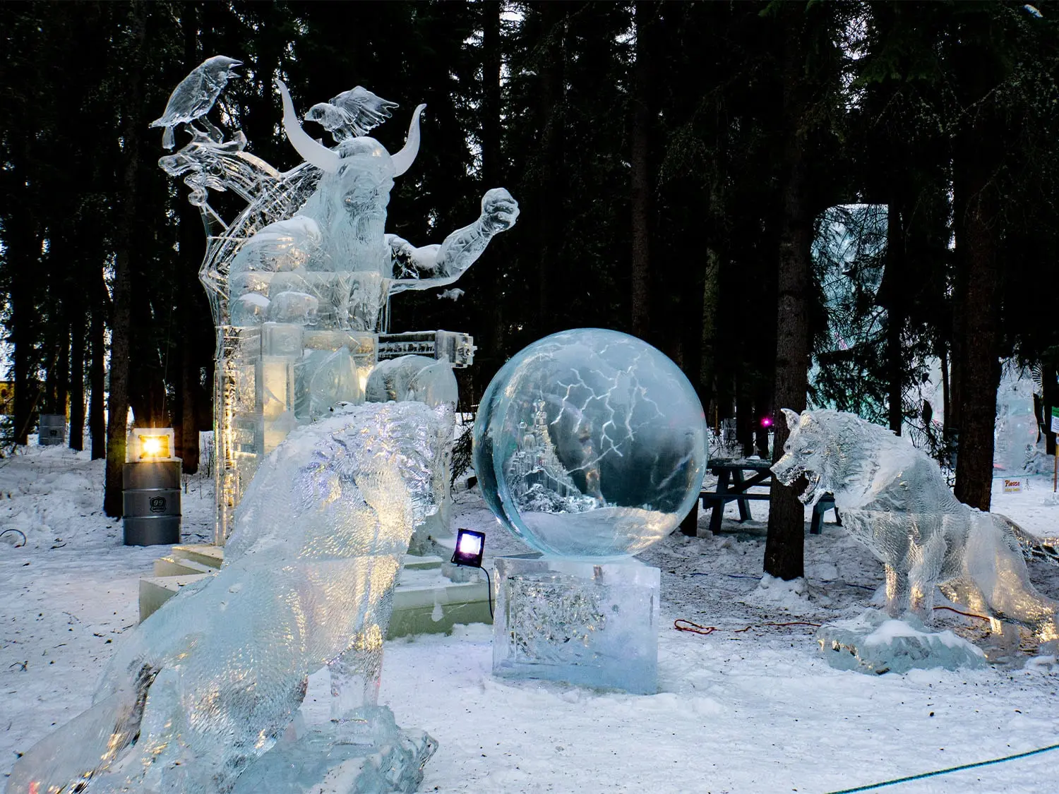 A breathtaking ice sculpture displayed outdoors in Alaska, showcasing Buddy Rasmussen's entry in an international competition.