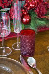 A table set for holidays, creating an elegant dining atmosphere.