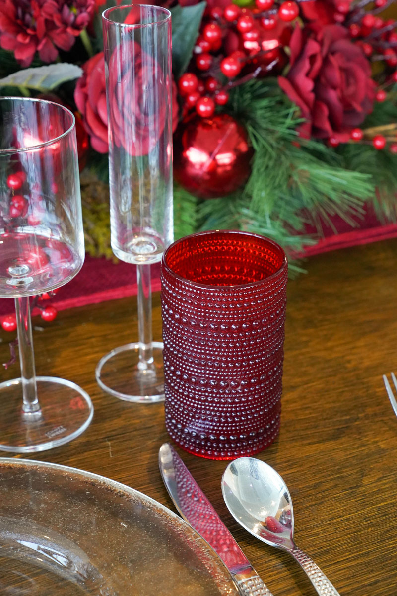 A table set for holidays, creating an elegant dining atmosphere.