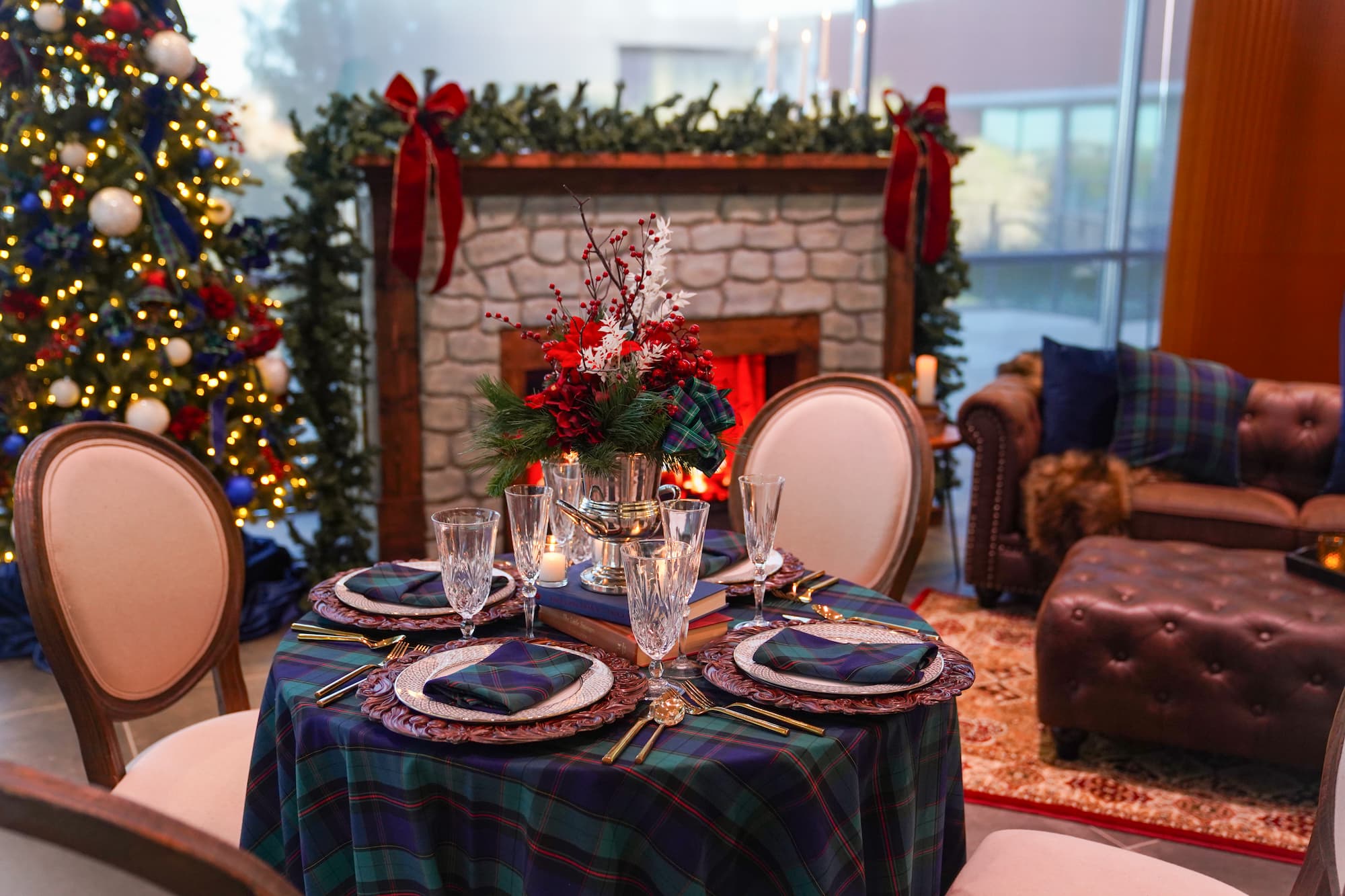 Christmas event setup with holiday décor and table settings